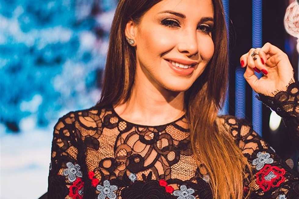 نانسي عجرم عن تداول صورتها مع رجل أعمال إسرائيلي: هويتي العربية فوق كل اعتبار | المصري اليوم