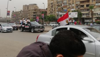 صور.. مسيرة بالسيارات بشارع جامعة الدول العربية للحث على التصويت بالانتخابات - اليوم السابع
