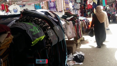 بالصور.. 'الميضة'.. سوق ملابس الغلابة في السيدة زينب (فيتشر)