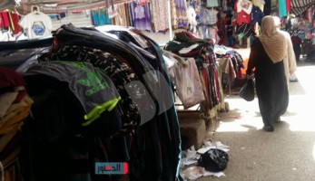 بالصور.. 'الميضة'.. سوق ملابس الغلابة في السيدة زينب (فيتشر)