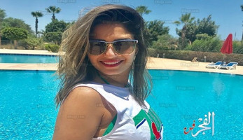 منة فضالي تشعل شاطىء 'مراسي' بفستان أحمر.. ومتابعيها: 'قشطات فلات عسلات' (صور)