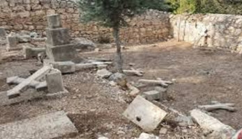 فلسطين.. مجهولون يعتدون على مقبرة مسيحية ويدمرون صلباناً وشواهد قبور