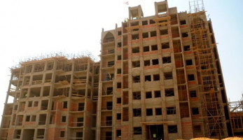 اقتراح بمشاركة البنوك في مبادرة طلاء واجهات العمارات