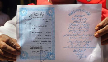 البنك الأهلي: توافد لتحصيل قيمة شهادات قناة السويس.. والمودعون يستثمرونها بأوعية إدخارية أخرى