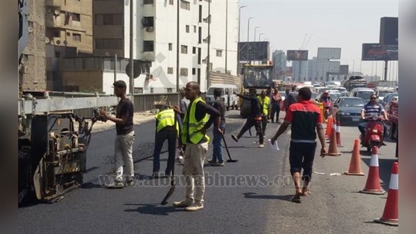 بالصور.. خدمات مرورية مكثفة أعلى الدائري من المعادي إلى المنيب