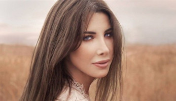 صورة طبق الأصل من والدتها.. نانسي عجرم تحتفل بتعميد ابنتها ليا