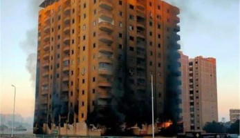 "النار انتهت".. آخر المستجدات بحريق برج الدائري
