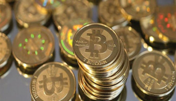 سعر البتكوين يتجاوز 59 ألف دولار لأول مرة