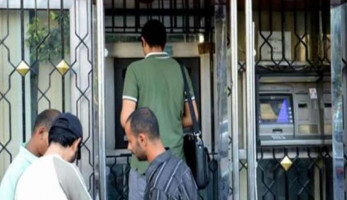 «لازم تعرف».. حقيقة فرض غرامة 50 جنيه عند السحب من الـATM بدون كمامة