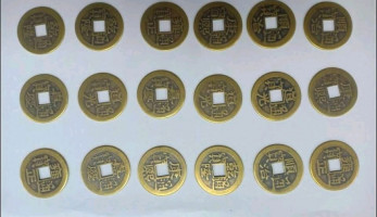 ضبط أجنبي بمطار القاهرة حاول تهريب 28 عملة أثرية إلى فرنسا