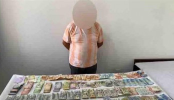 ضبط عاطل لقيامه بالاتجار في النقد الأجنبي خارج السوق المصرفية